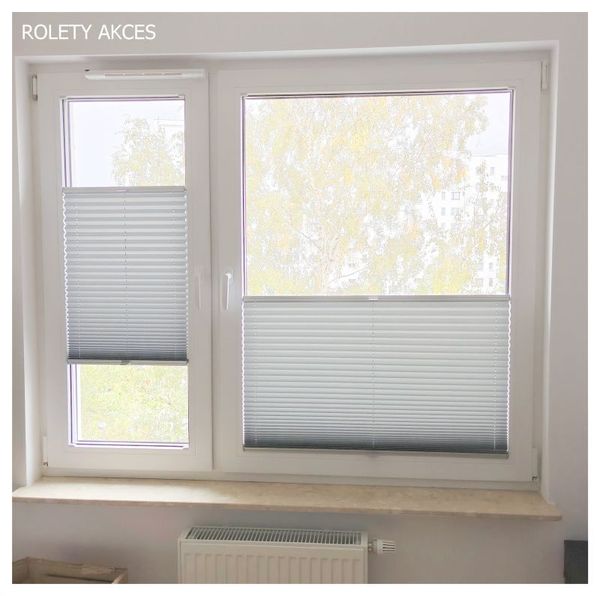 Szare plisy okienne – stylowe i funkcjonalne rozwiązanie, które wprowadza harmonię do wnętrza.